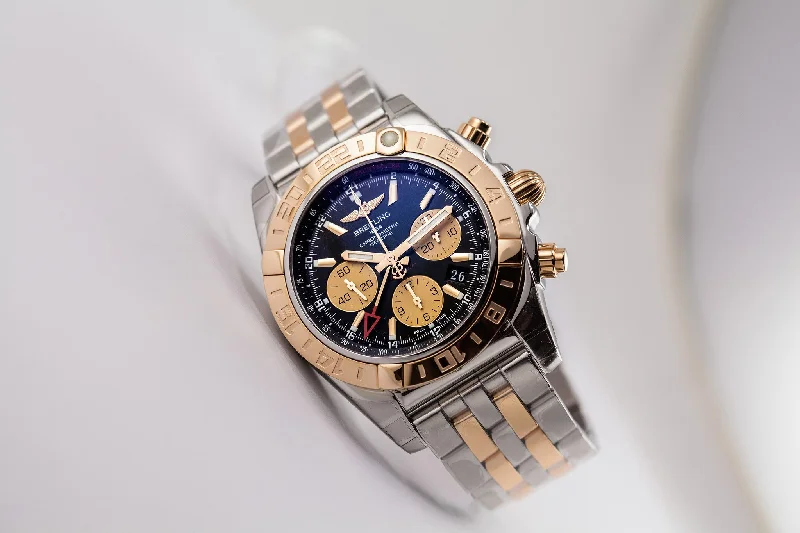 Breitling Chronomat 44 GMT 18kt Gold/SS Black Dial